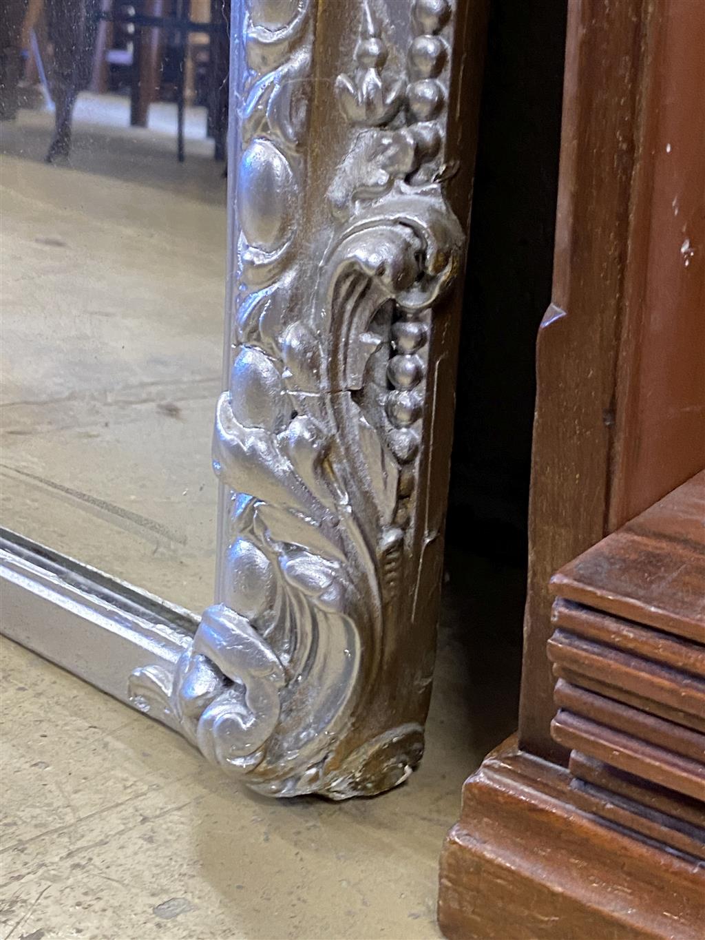 A Victorian, later silvered carved wood framed overmantel mirror, width 92cm, height 195cm